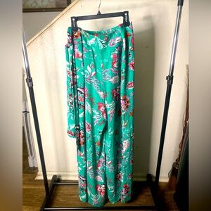Floral print with turquoise background.
